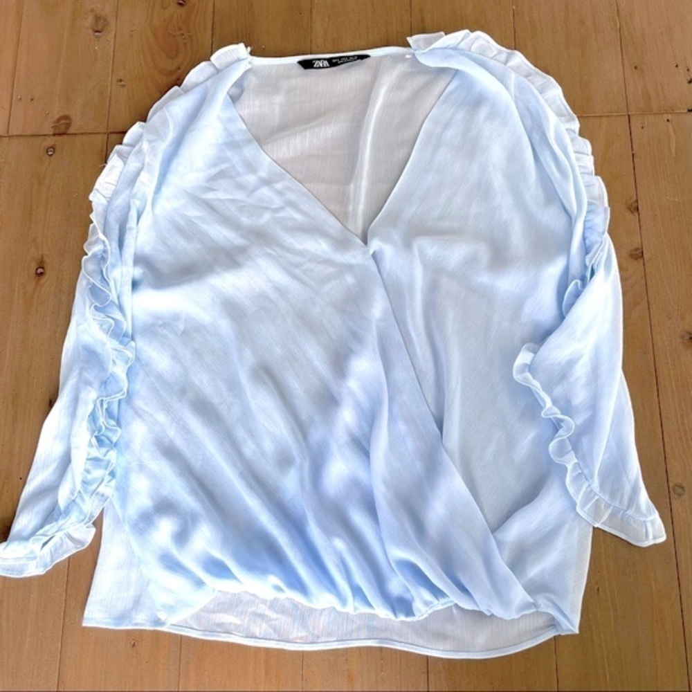 Zara light blue ruffle blouse